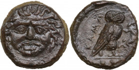 Sicily. Kamarina. AE Tetras, c. 420-410 BC. Obv. Gorgoneion facing. Rev. Owl standing right. HGC 2 546; CNS III 19; SNG ANS 1221/4. AE. 4.00 g. 15.00 ...