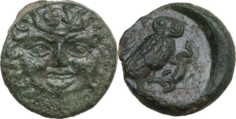 Sicily. Kamarina. AE Tetras, c. 420-410 BC. Obv. Gorgoneion facing. Owl grasping...