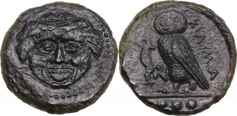 Sicily. Kamarina. AE Tetras, c. 420-405 BC. Obv. Gorgoneion facing. Rev. Owl sta...