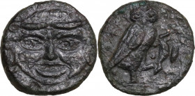 Sicily. Kamarina. AE Onkia, 425-405 BC. Obv. Facing gorgoneion. Rev. Owl standing right. HGC 2 552; CNS III 7. AE. 1.10 g. 11.00 mm. Rare. Rough surfa...