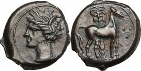 Punic Sardinia. AE 16 mm. c. 360-330 BC, uncertain mint. Obv. Wreathed head of Kore left, wearing triple-pendant earring. Rev. Horse standing right; i...