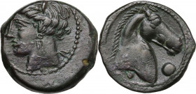Punic Sardinia. AE 19.5 mm. c. 300-264 BC. Uncertain mint. Obv. Wreathed head of Kore left. Rev. Horse's head right; before, globe; below, pellet. Lul...