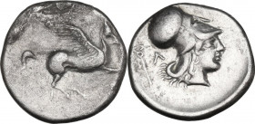 Continental Greece. Akarnania, Leukas. AR Stater, c. 350-320 BC. Obv. Pegasos flying right; Λ below. Rev. Helmeted head of Athena right; caduceus and ...