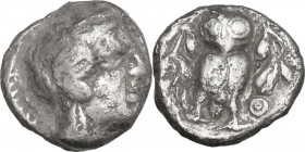 Continental Greece. Attica, Athens. AR Trihemiobol, c. 454-404 BC. Obv. Helmeted head of Athena, right. Rev. Owl standing facing, wings spread; olive ...