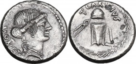 T. Carisius. AR Denarius. 46 BC. Rome mint. Obv. Head of Juno Moneta, right. Rev. Anvil die with garlanded punch die above; on left, tongs; on right, ...