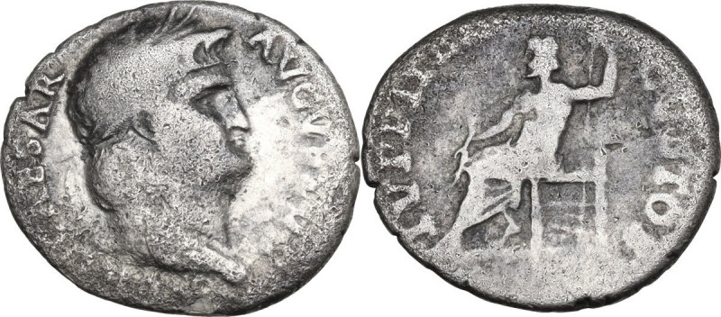 Nero (54-68). AR Denarius. Obv. Laureate head right. Rev. Jupiter seated left, h...