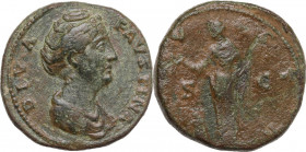 Diva Faustina I (died 141 AD). AE Sestertius, 146-161. Obv. Draped bust right. Rev. Vesta standing left, holding palladium and sacrificing with patera...