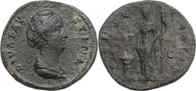 Diva Faustina I (died 141 AD). AE Sestertius, struck under Antoninus Pius, after 141 AD. Obv. Draped bust right. Rev. Vesta standing left, sacrificing...