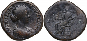 Lucilla, wife of Lucius Verus (died 183 AD). AE Sestertius, 163/4 AD. Obv. Draped bust right. Rev. Juno seated left, holding flower and infant(?). RIC...