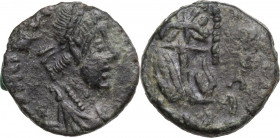 AE Nummus in the name of Justinian I, unclassified. AE. 1.20 g. 11.00 mm. EF.