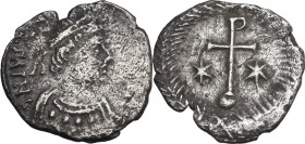 Justinian I (527-565). AR Half Siliqua, Ravenna mint. Obv. Diademed and cuirassed bust right. Rev. Rho-headed cross, surmounting globus, stars flankin...