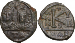 Justin II, with Sophia (565-578). AE Half Follis. Dated RY 8 (572/3). Carthage mint. Obv. Facing bust of Justin and Sophia. Rev. Large K. D.O. 198; MI...