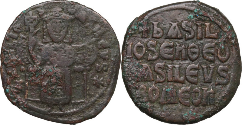 Basil I (867-886). AE Follis. Obv. Basil enthroned facing, wearing crown and lor...