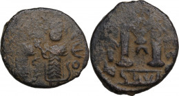 Arab-byzantine, Umayyad Caliphate, pre-reform coinage. AE Fals, Baalbek mint, 41-77 H / 661-697 AD. D/ Byzantine emperor and son, facing. R/ Large M. ...