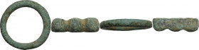Lot of two bronze elements, probably used as currency. Bronze age. 25 mm, 28 mm.