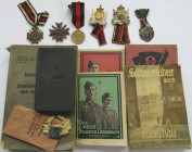 Orden & Ehrenzeichen: Kleines Lot diverse Orden und Bücher. Dabei Ehrenkreuz für Frontkämpfer mit Schwertern 1914-1918, Kriegsverdienstkreuz mit Schwe...
