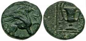 Ionia, Teos. civic issue. Ca. 210-190 B.C. AE 12 (12 mm, 1.67 g, 7 h). Griffin seated right, raising forepaw / [TH]IΩN, ethnic vertically downwards to...