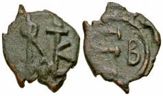 Justin II. 565-578. AE pentanummium (14.1 mm, 1.11 g, 7 h). Constantinople mint.. Sear monogram # 8 / Large Є, to right, B; all within circle. SBCV 36...
