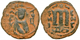 Arab-Byzantine, Umayyad Caliphate. AE follis (22 mm, 3.45 g, 7 h). Hims (Emesa) mint. Facing Umayyad Imperial bust / EMI to left of M,birds eye on eit...