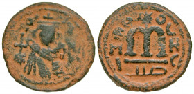 Arab-Byzantine, Umayyad Caliphate. Contemporary Imitation. AE follis (20.8 mm, 3.11 g, 10 h). Hims (Emesa) mint. Facing Umayyad Imperial bust / EMI to...