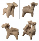 A Syro-Hittite terracotta votive in the form of yoked bulls, ca. 1200-1000 B.C.. A Syro-Hittite terracotta votive in the form of yoked bulls, ca. 1200...