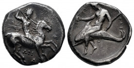 Calabria. Tarentum. Nomos. 315-302 BC. (Vlasto-634). (HN Italy-939). Anv.: Warrior on horseback right, holding shield and two spears, preparing to cas...