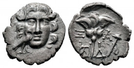 Caria. Mylasa. Drachm. 170-130 BC. (S-14, 196). Anv.: Facing head of Helios; to lower left and superimposed on cheek, eagle standing right. Rev.: Rose...