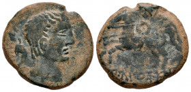 Ikalkusken. Unit. 120-20 BC. Iniesta (Cuenca). (Abh-1399). Anv.: Male head right, dolphin behind. Rev.: Horseman left, holding round shield and spear,...