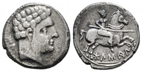 Bolskan. Denarius. 180-20 BC. Huesca. (Abh-1914). (Acip-1412 var.). Anv.: Bearded head right, pellet below the neck, iberian letters BON behind. Rev.:...