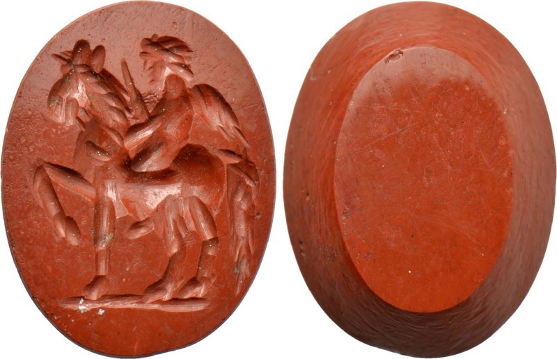 CARNELIAN INTAGLIO with horse and rider. Roman, circa 2nd-3rd centuries. 

Obv...