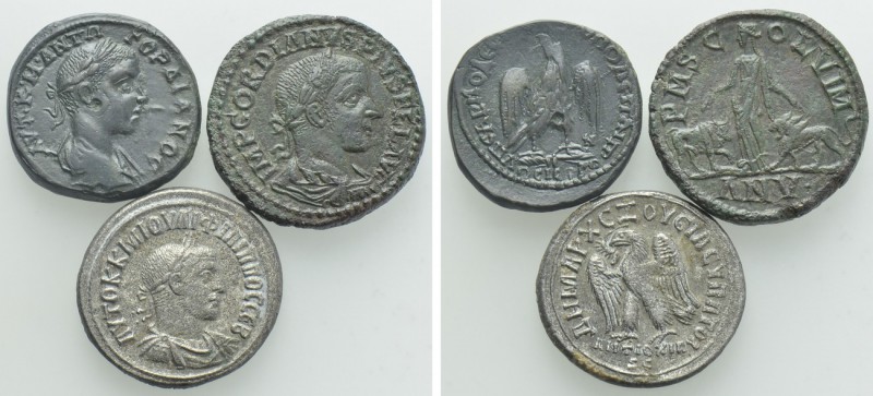 3 Roman Provincial Coins. 

Obv: .
Rev: .

. 

Condition: See picture.
...