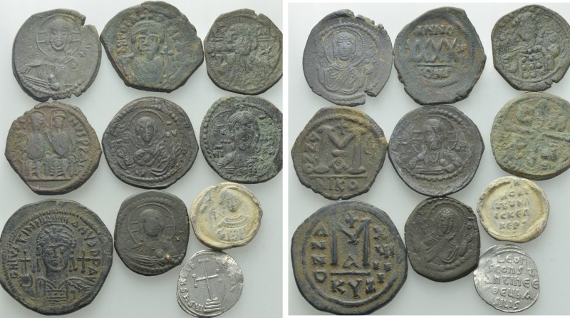 10 Byzantine Coins and Seals. 

Obv: .
Rev: .

. 

Condition: See picture...