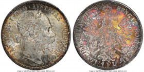 Franz Joseph I Florin 1879 MS66 NGC, Vienna mint, KM2222. Whirling luster draped in a virtual kaleidoscope of color blended masterfully in shades of a...