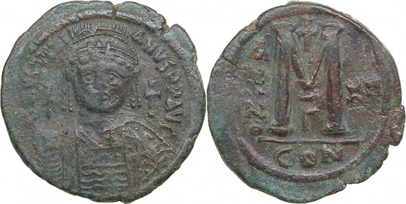 Byzantine Æ Follis - Justinian I (527-565 BC)
21.32g. 38mm. VF-/VF