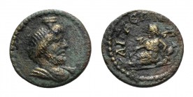 Aeolis, Aigai. Pseudo-autonomous issue, 2nd-3rd century AD. Æ (14mm, 2.22g, 6h). Draped bust of Serapis r., wearing kalathos. R/ River-god (Titnaios) ...