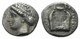 Ionia, Kolophon, c. 375-360 BC. AR Diobol (9mm, 1.02g, 12h). Laureate head of Apollo left / Lyre. SNG Copenhagen 141-2. VF