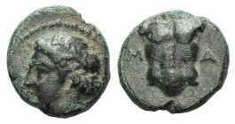 Ionia, Magnesia ad Maeandrum, c. 400 BC. Æ (7mm, 0.60g, 5h). Laureate head of Apollo l. R/ Cuirass. SNG Kayhan 393-4. Rare, green patina, VF