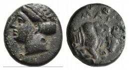 Ionia, Magnesia ad Maeandrum, c. 400-350 BC. Æ (11mm, 2.07g, 6h). Laureate head of Apollo l. R/ Forepart of bull butting r.; maeander behind. SNG Cope...