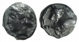 Ionia, Magnesia ad Maeandrum, c. 400-350 BC. Æ (7mm, 0.72g, 11h). Laureate head of Apollo l. R/ Forepart of bull butting l. SNG Copenhagen 802 var. (b...