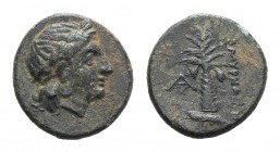 Ionia, Smyrna, c. 301-288 BC. Æ (12mm, 1.68g, 6h). Laureate head of Apollo r. R/ Palm tree; monogram to l.; below, shrimp l. Milne 21 var. (monogram);...