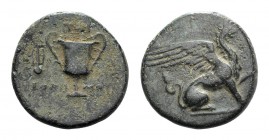 Ionia, Teos, c. 370-330 BC. Æ (13mm, 1.96g, 12h). Eudemos(?), magistrate. Griffin seated r., l. paw raised. R/ Kantharos; lyre to l. Cf. BMC 28. Green...