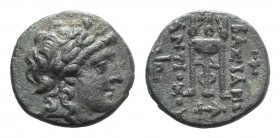 Seleukid Kings, Antiochos II (261-246 BC). Æ (16.5mm, 3.58g, 12h). Tralles(?). Laureate head of Apollo r. R/ Tripod; monograms to outer l. and r., anc...