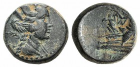Phoenicia, Arados, c. 176/5 BC - AD 115/6. Æ (18mm, 7.71g, 12h). Turreted and draped bust of Tyche r., palm over shoulder. R/ Poseidon reclining l. on...