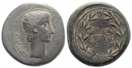 Augustus (27 BC-AD 14). Asia Minor, Uncertain. Æ (26.5mm, 12.65g, 12h), c. 27 BC. Bare head r. R/ AVGV/STVS in two lines within laurel wreath. RPC 223...