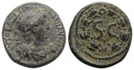 Hadrian (117-138). Seleucis and Pieria, Antioch. Æ (21mm, 6.53g, 12h). Laureate, draped and cuirassed bust r. R/ Large SC; Γ below; all within laurel ...