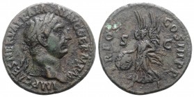 Trajan (98-117). Æ As (28mm, 10.36g, 6h). Rome, AD 100. Laureate head r. R/ Victory flying l., holding shield inscribed SPQR and palm. RIC II 417. VF