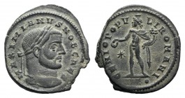 Galerius (Ceasar, 293-305) Æ Follis (28mm, 9.43g, 12h). Ticinum, 296-7. Laureate head r. R/ Genius standing l., holding patera and cornucopiae, star/S...
