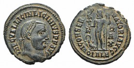 Licinius I (308-324). Æ Follis (20mm, 2.88g, 6h). Alexandria, 316-7. Laureate head r. R/ Jupiter standing facing, head l., holding Victory on globe an...