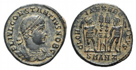 Constantius II (Caesar, 324-337). Æ (16mm, 2.40g, 6h). Antioch, 330-5. Laureate and cuirassed bust r. R/ Two soldiers flanking two standards; SMANZ. R...