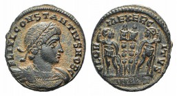 Constantius II (Caesar, 324-337). Æ (17mm, 2.39g, 12h). Antioch, 330-5. Laureate and cuirassed bust r. R/ Two soldiers flanking two standards; SMANZ. ...
